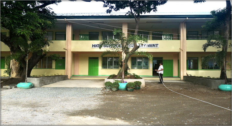 The image shows the constructed Plant Boxes and cemented Path Walks on the new Junior High School Building