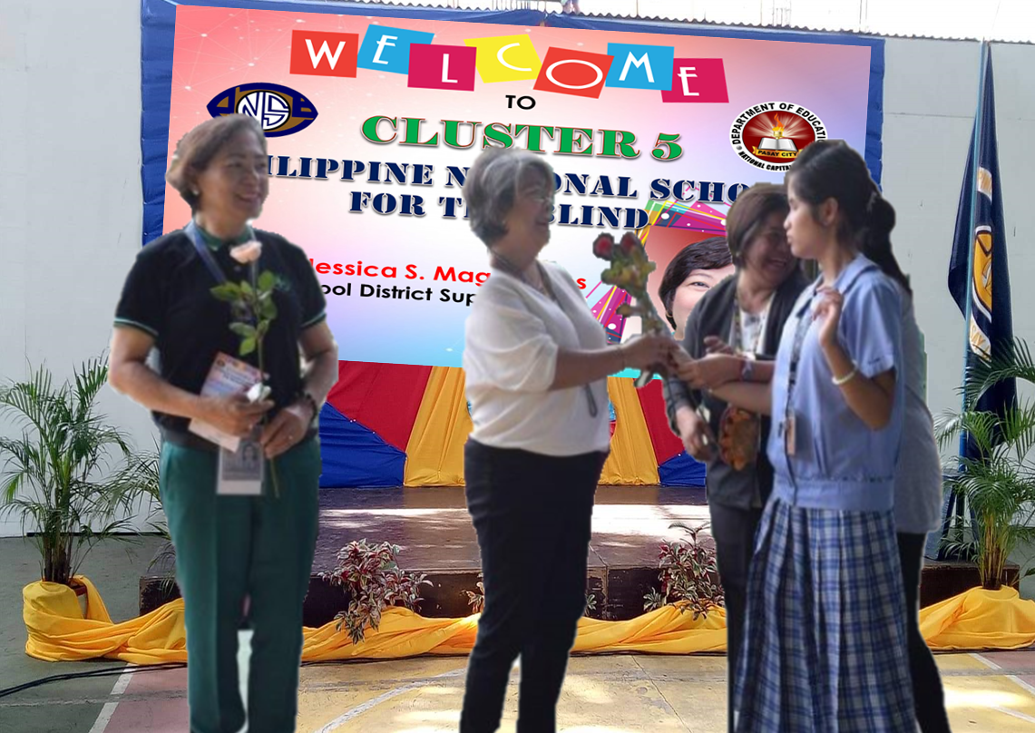 Dr. Jessica Magayanes receiving flowers from a student